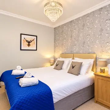 Cosy Blue-Toned Floral Bedroom