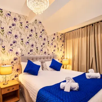 Floral Boutique Bedroom with Blue Accents