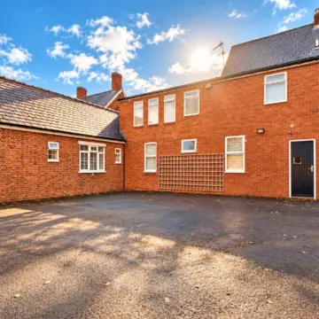 Sunlit Brick Courtyard Architecture