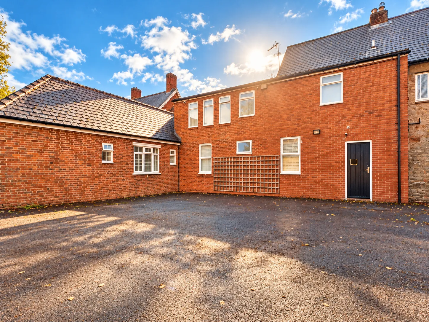 Sunlit Brick Courtyard Architecture