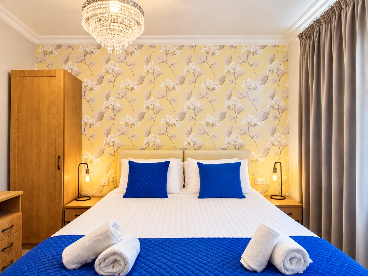 Symmetrical Blue and Gold Hotel Bedroom (1)