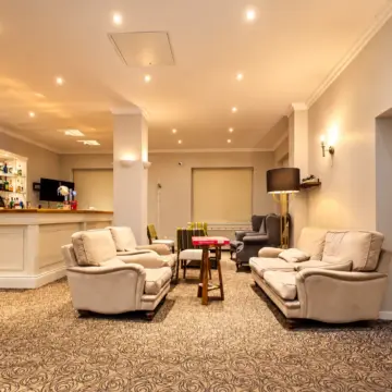 Warm Hotel Lounge with Pizza Box