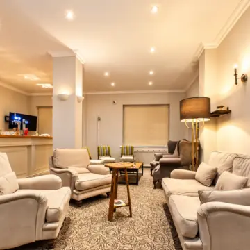 Warm, Symmetrical Hotel Lounge Bar