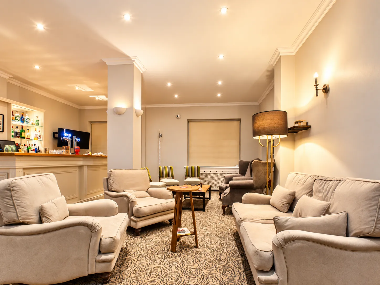 Warm, Symmetrical Hotel Lounge Bar